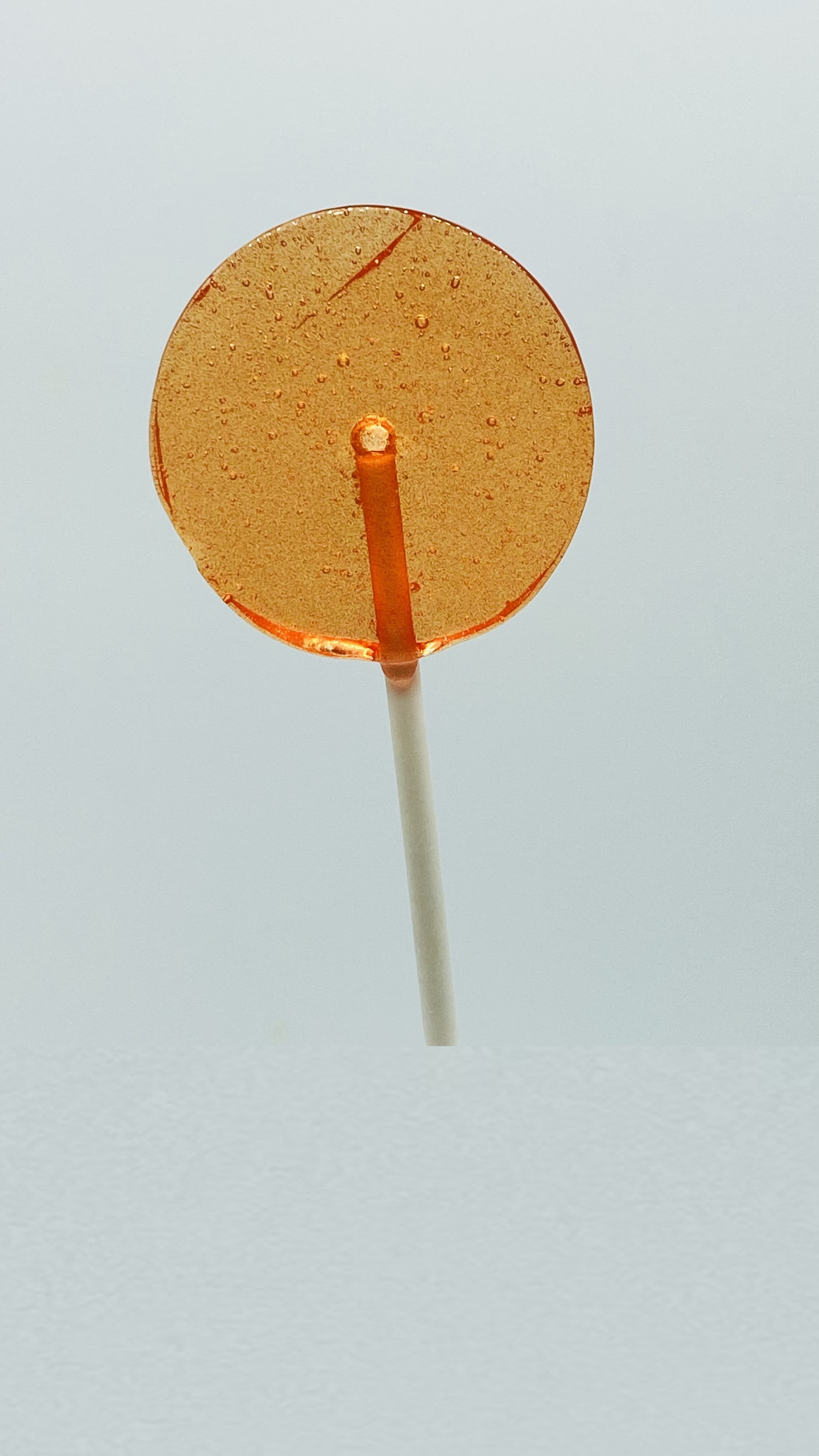 Paprika orange in hard boiled candy lollies
